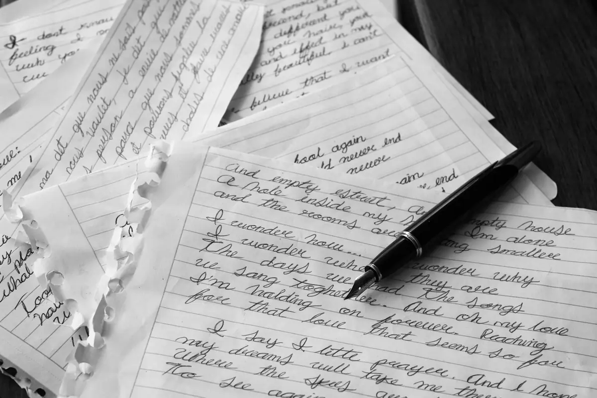 A pen on a handwritten letter