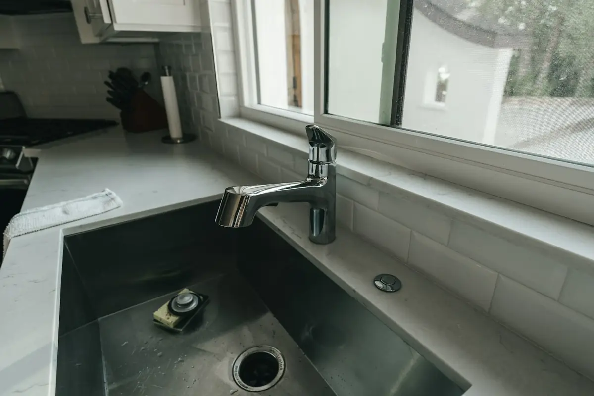 A kitchen sink and tap